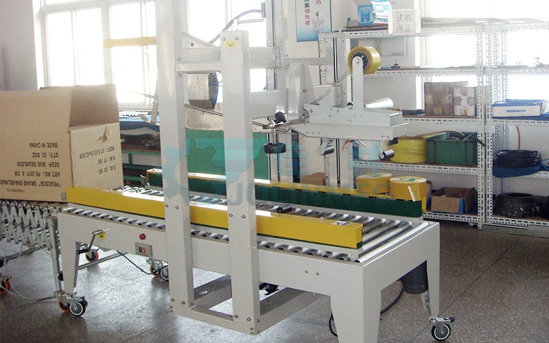 自動(dòng)折蓋封箱機(jī)